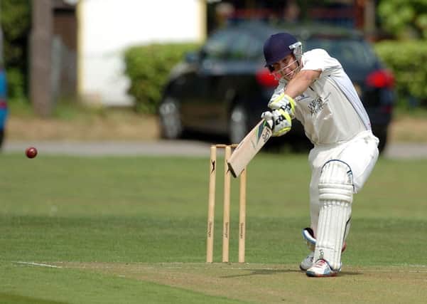 Matlock batsman James Smith adds runs to the board on his way to a half century at Sandiacre on Saturday.