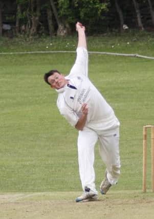 Matlock all-rounder Chris Fletcher, pictured bowling earlier in the season, hit a century at Swarkestone on Saturday.