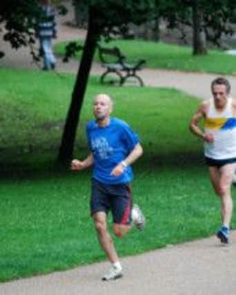 Rob White of Buxton AC, who went on to win the Pavilion Gardens 5K race.