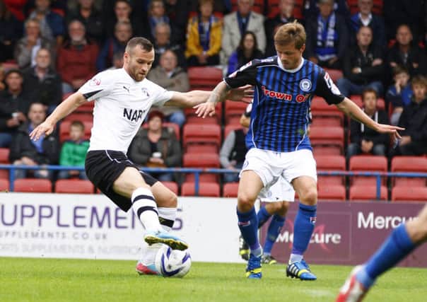 Jimmy Ryan keeps close control over the ball at Rochdale by Tina Jenner