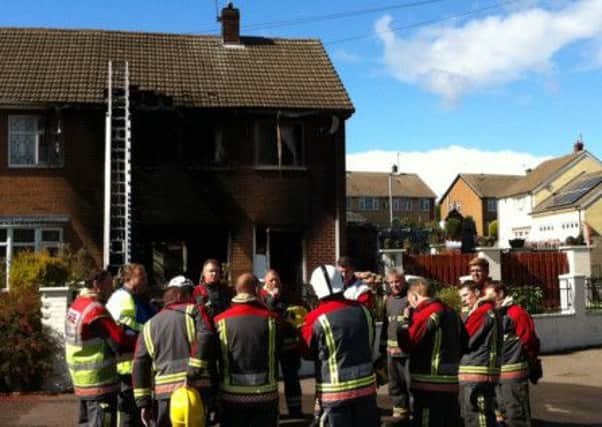 Pictured are Derbyshire firefighters after extinguishing the house blaze at Avondale Road, Inkersall, near Staveley, on Wednesday afternoon, September 18.