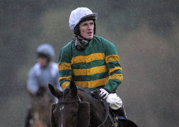 Tony McCoy on Well Hello There, following the fifth race, The Smith and Williamson Handicap Steeple Chase, at Exeter Racecourse, Exeter. PRESS ASSOCIATION Photo. Picture date: Tuesday November 5, 2013. See PA Story RACING Exeter. Photo credit should read: Tim Ireland/PA Wire.