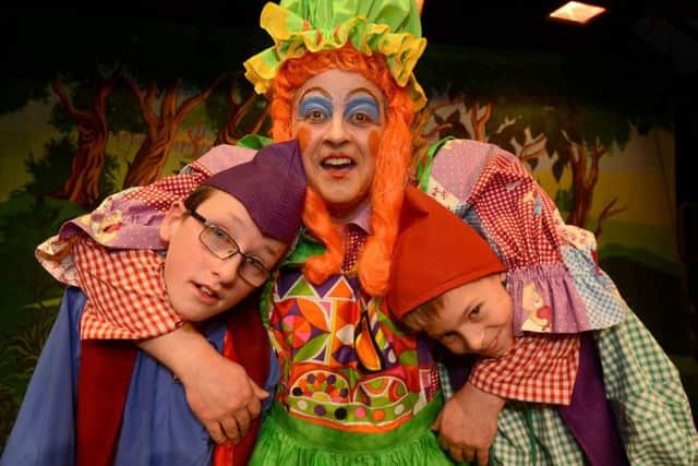 Youlgrave panto, Nic Wilson as Nurse Nicely with Tom Birch and Damian Glover as her sons