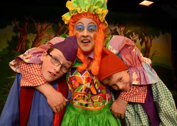 Youlgrave panto, Nic Wilson as Nurse Nicely with Tom Birch and Damian Glover as her sons