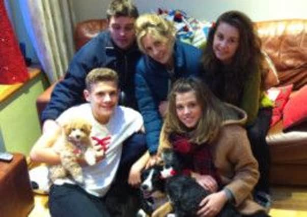 The Blackbourn family with Alyssas brother Ethan (bottom left) holding Lola.