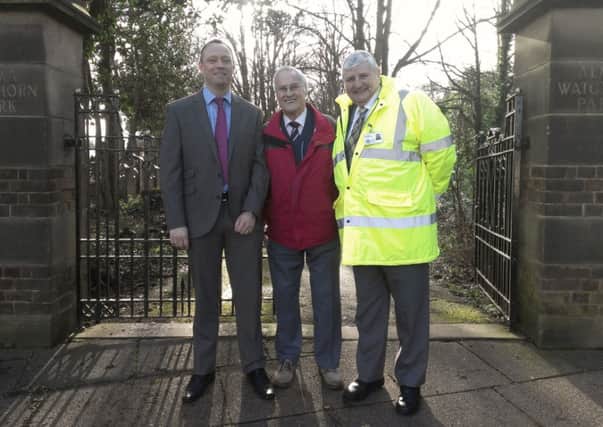 From left to right: Amber Valley Borough Council assistant director of landscape services Simon Gladwin, alongside resident Ron Padley and Cllr Peter Makin, right - outside the gates of Alma J Watchorn Park, Alfreton.