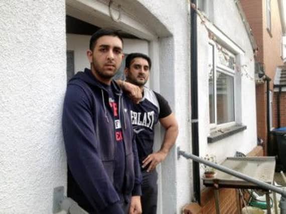 Picture: Martin NaylorCaption for these pics: Arjun Atwal, 20 and his father Councillor Ajit Atwal, 43, who chased and helped catch a burglar who tried to break into their home, in Burton Road, Derby, in the early hours of December 28, 2013.