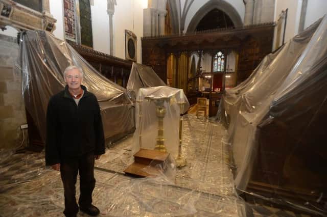 Bill Bryant in the Chancel of Bakewell Parish Church during the current roof repairs