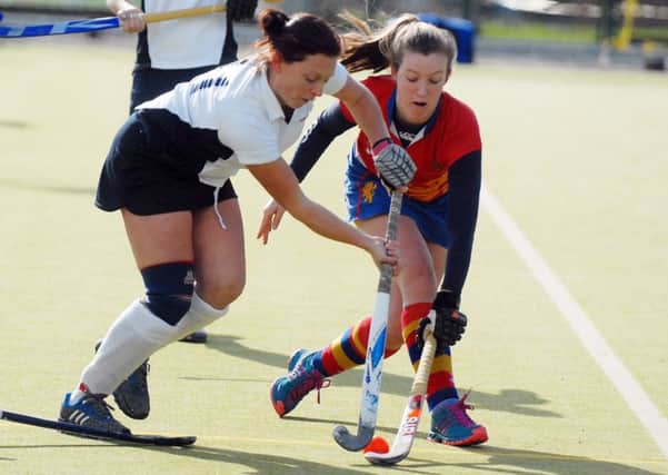 Leyanne Beacham (left) takes on the Birmingham defence on Saturday. Photo by Brian Eyre (NMAM 03-03-14 BE 17)