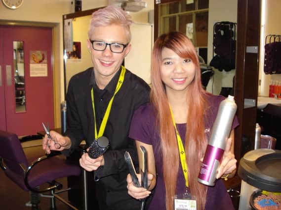 Buxton and Leek College advanced hairdressing students Cerne Webster-Price and Sukanta Thongdonnoi. Photo contributed.