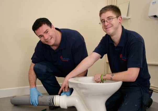 Futures Homescapes Executive Director Paul Parkinson with apprentice plumber Liam Jenkins