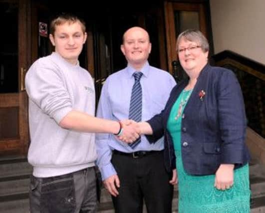 Former High Peak Borough Council apprentice and now supervisor Richard Howard, centre, with current apprentice Nicholas Knowles and council leader Caitlin Bisknell. Photo contributed.