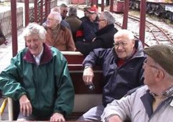 Members of Matlock Forum Club on a guided tour of the Midland Railway Museum.