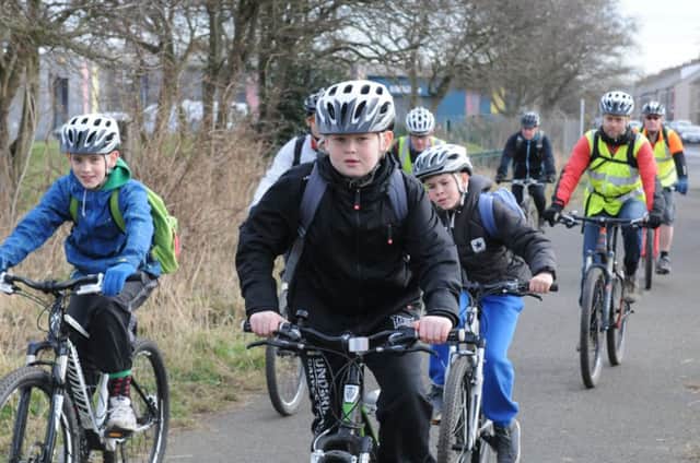 Pupils from New Delaval Primary School in Blyth cycling with Sustrans after 4 new bikes were donated. GM033592