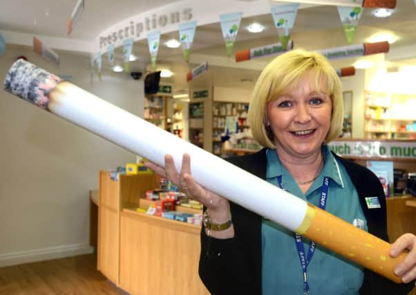 Diane Chandler is encouraging locals to stop smoking as they stub out a giant cigarette for No Smoking Day 2014. (illustative picture)