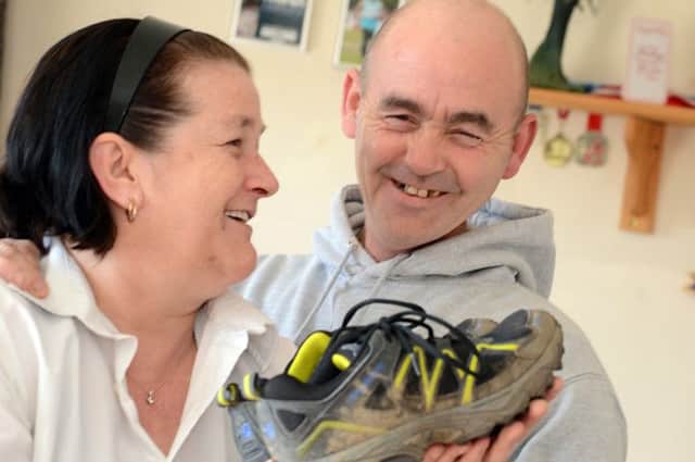 Lynn Musson gives some encouragement to husband Neil who is in training for a 93 mile run along the Pennine Way in aid of Muscular Dystrophy.