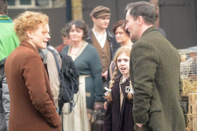 The Village, Maxine Peake chats to fellow actor Derek Riddell between takes