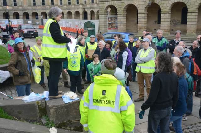 Buxton Town Team's big spring clean, the volunteers are briefed before spreading out across the town