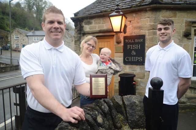 Winner of the chip shop of the year title is the tiny Toll Bar Fish and Chips at Stoney Middleton, Wayne Jagger with his wife Rachel son George and brother luke