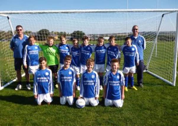 Pictured are a Chesterfield Junior Blues' U11s football team.