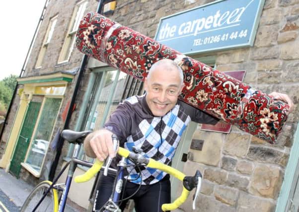 Cycling fundraiser Charlie Last, of The Carpeteer, Dronfield.