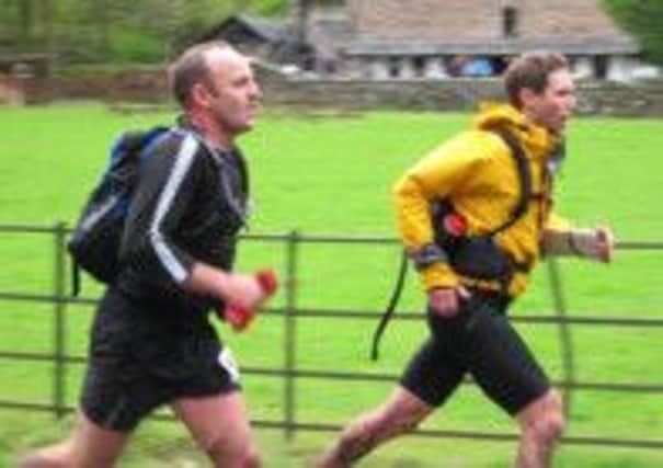 Alasdair Cowell and Tim Budd, of Glossop, training for their ultra-marathon in the Lakes. Photo contributed.