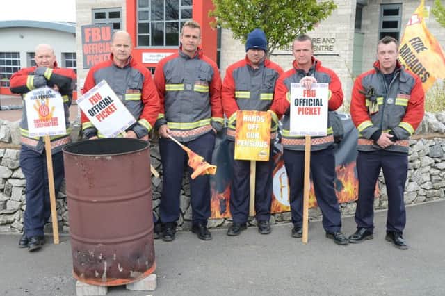 Buxton Firefighters picketing outside their station