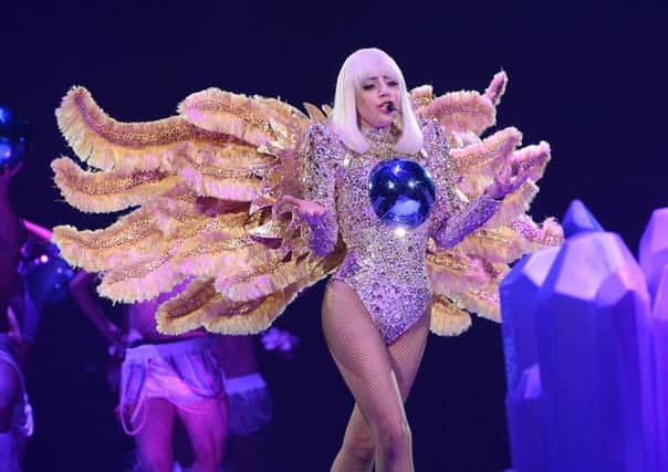 Lady Gaga performs onstage during "The ARTPOP Ball" tour. Photo: Kevin Mazur/WireImage.