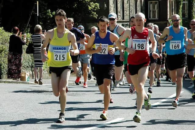 Action from the 2013 Lomas Distribution Buxton Half Marathon. Photo by Bryan Dale.