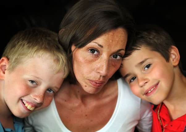 Kelly Murray and her sons, Bradley, 10 and Louis 9.