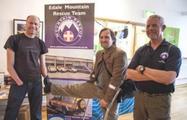 copJamie Andrew and Johnny Dawes with Dave Torr, Edale Mountain Rescue Teams Fundraising Director. Photo contributed.