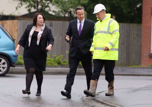 PM David Cameron arrives on site.