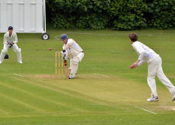 Clifton batsman Jack Barker prepares to deal with an Ed Lander delivery as wicket keeper Harvey Hosein watches on. Photo by Rachel Atkins.