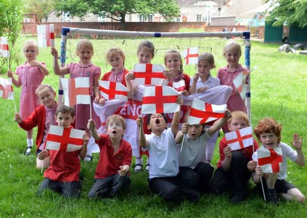 Children at Horsley Woodhouse Primary School get into the spirit of the World Cup