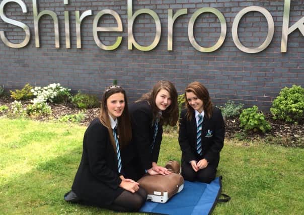 Alysia Middleton, Shannon Stubbs and Macauley-Leigh Carrington promote the world record attempt at Shirebrook Academy.