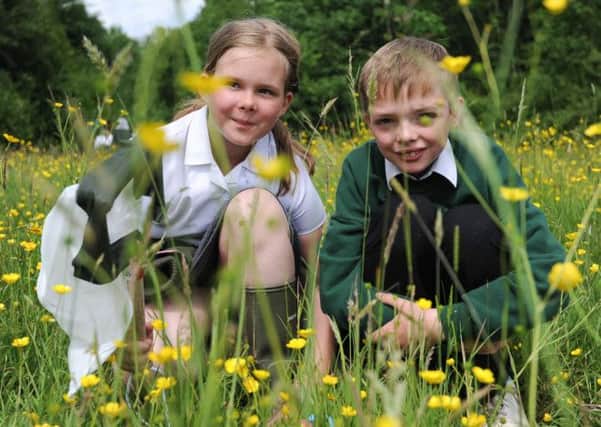 Woodside Wild Barn launch of new nature reserve. Pictured from Mapperley Primary are Gracie Cook 10 and Tom Garnett 11.