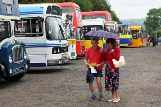 The rain did not stop Dave and Barbara Challenger enjoying looking at the line up of buses.