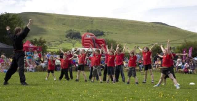 Edale Church of England Primary School children doing t'ai chi on Edale Country Day. Photo contributed.