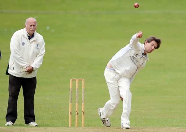 Matlock bowler Ed Lander in action against Eckington.