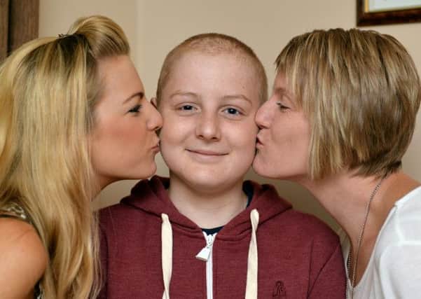 14 year old Ryan Coutts is busy fundraising for Children's Brain Tumour Research, Ryan is pictured with his Aunt Kerry Newman and Mum Caroline Coutts