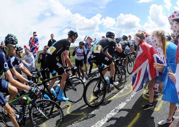 Tour De France, Chris Froome (Centre) tackles on the Holme Moss Climb...6th July 2014 Picture by Simon Hulme