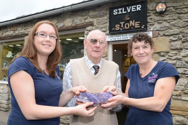 Three generations from Treak Cliff Cavern, Elisabeth Turner her mother Vicky Turner and Grandfather Peter Harrison open the new shop and silversmith workshop in Castleton.