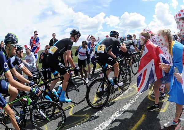 Tour De France, Chris Froome (Centre) tackles Holme Moss in the Peak District Park. Picture by Simon Hulme