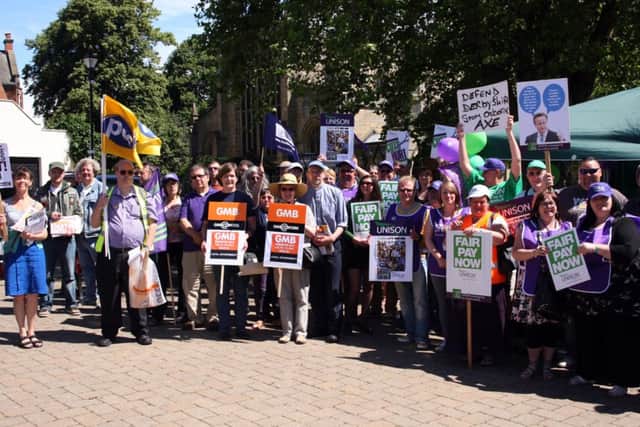 Unions join together for the rally.