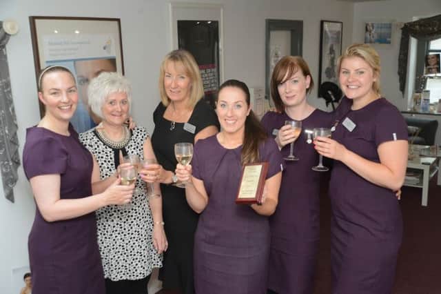 The Face Facts team with their Salon of the Year trophy