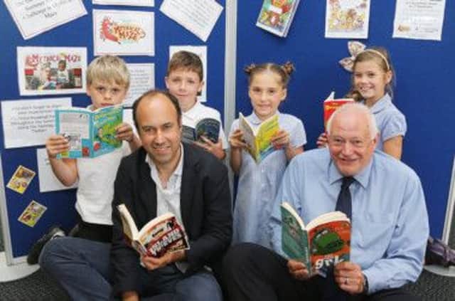It's good to read. Derbyshire County Council Cabinet Member for Health and Communities Dave Allen and author Josh Lacey are joined by pupils from Abercrombie Primary School in Chesterfield for the launch of the Summer Reading Challenge