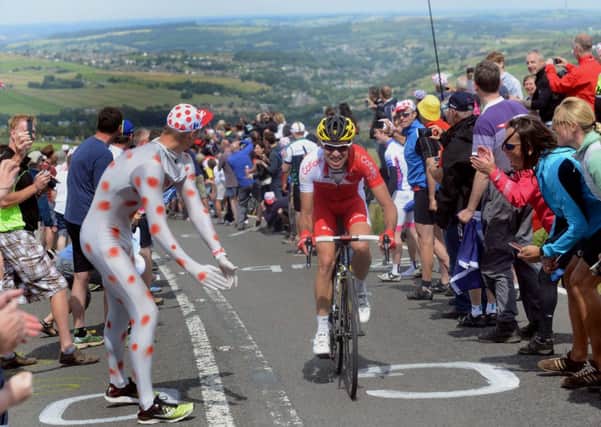 Lead rider..??? in the lead up Holme Moss climb on the Tour de France Stage 2..6th July 2014 ..Picture by Simon Hulme
Peak District National Park Authority's Holme Moss.