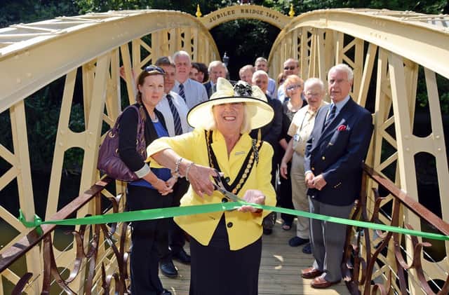 Matlock jubilee bridge reopened. Cllr Carol Walker chairman Derbyshire Dales cutting the ribbon.