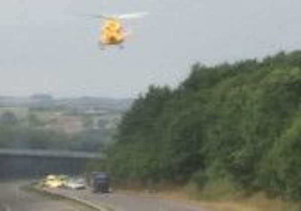 Air ambulance hovers over a crash on the Dronfield bypass