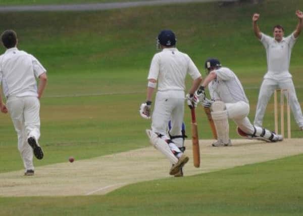 Matlock appeal for a wicket after a delivery to Ilkeston batsman David Smit